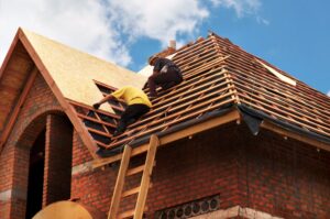 Roofer working on a roof