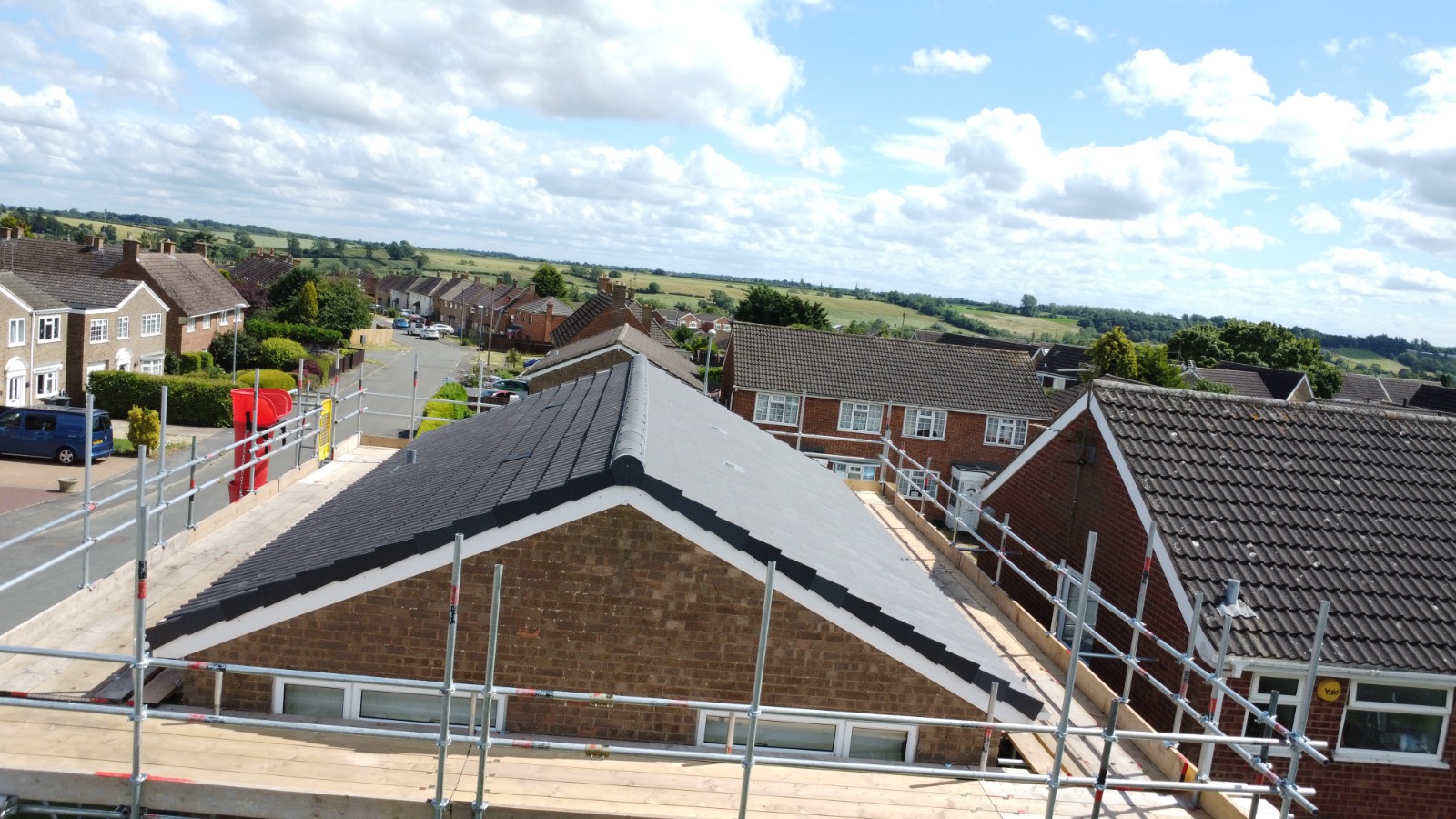 High up, wide view of a roof.